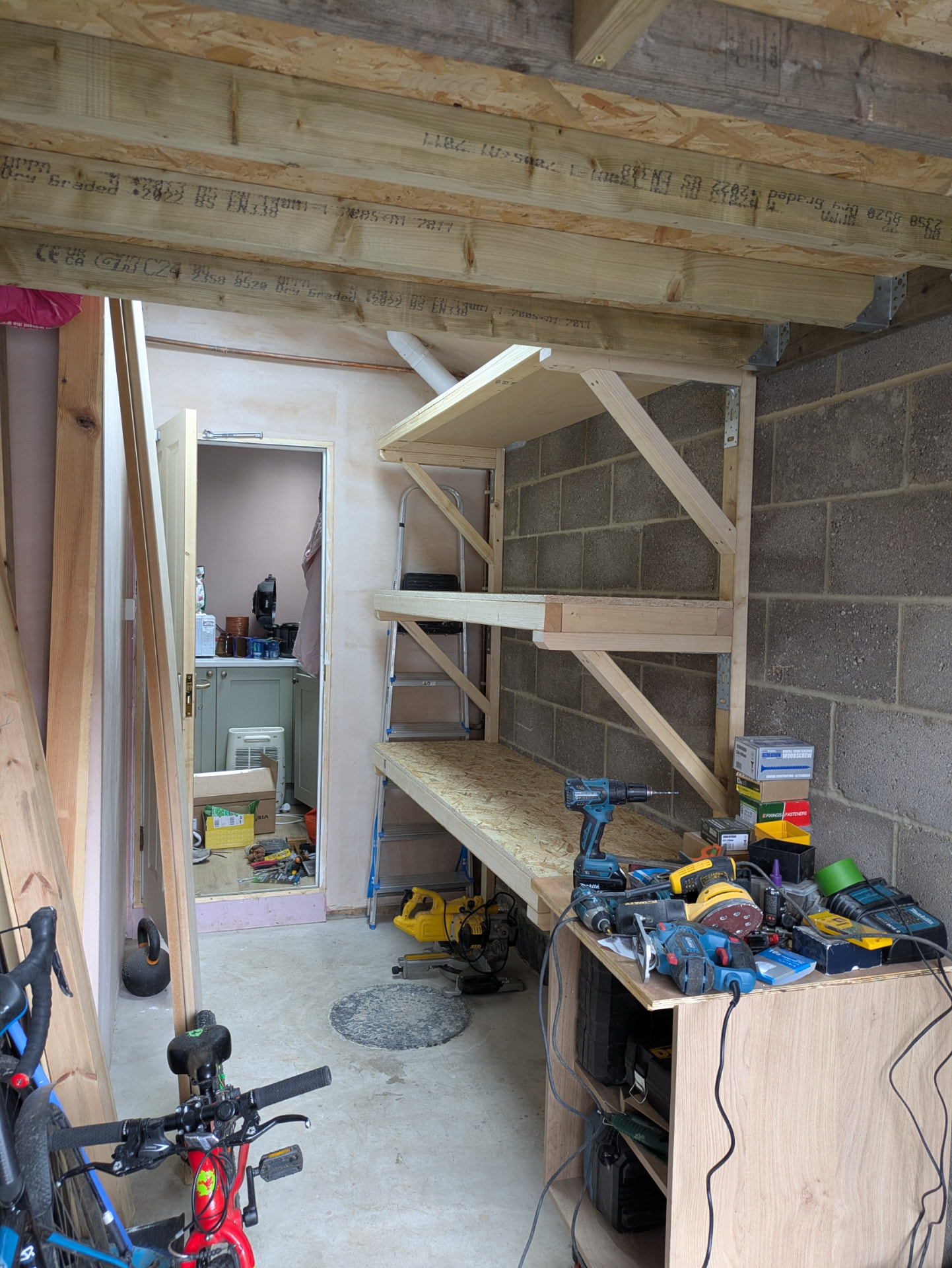 Garage shelving — full storage run with workbench area