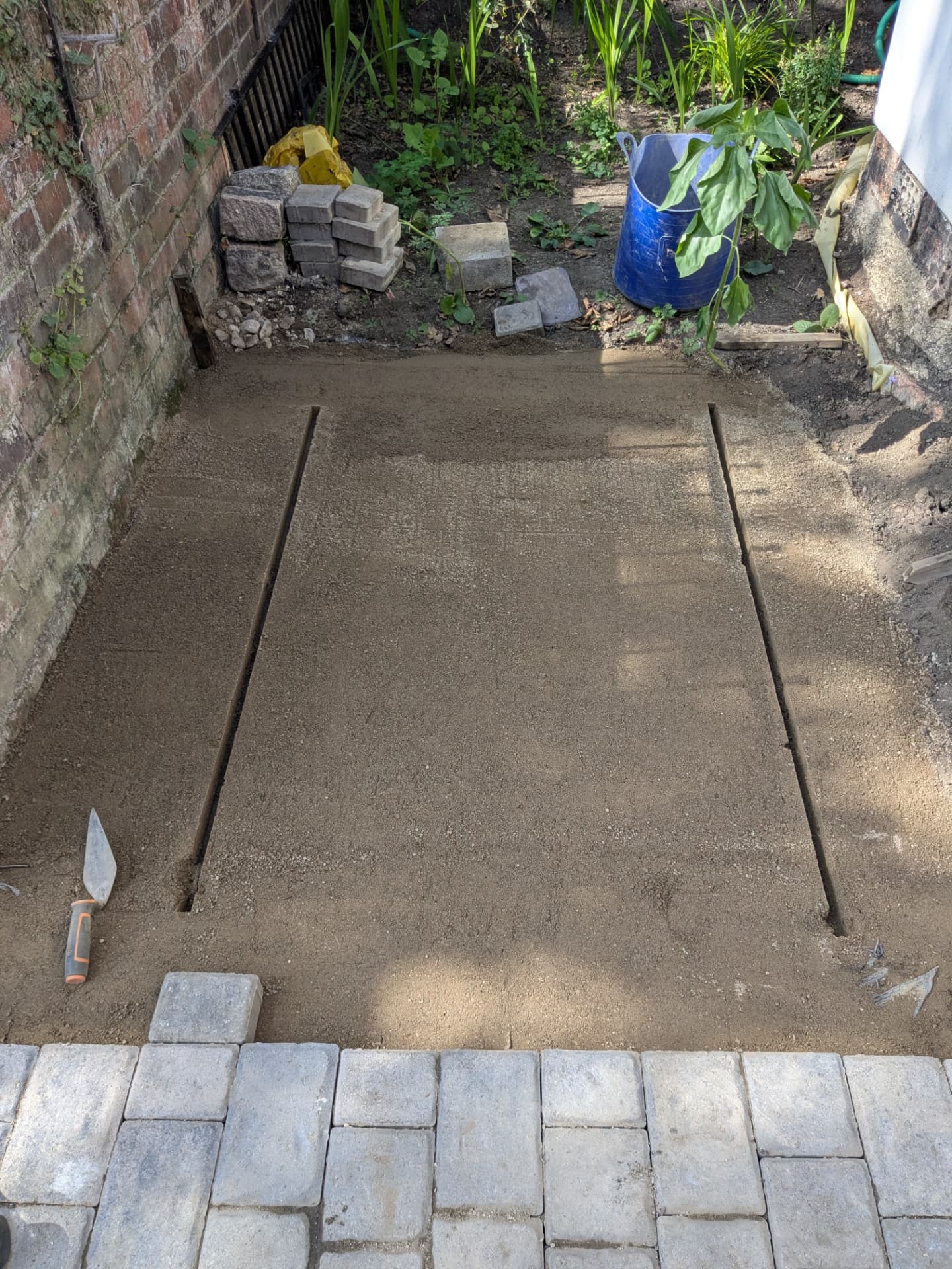 Block paving extension — base prepared and edging set before laying