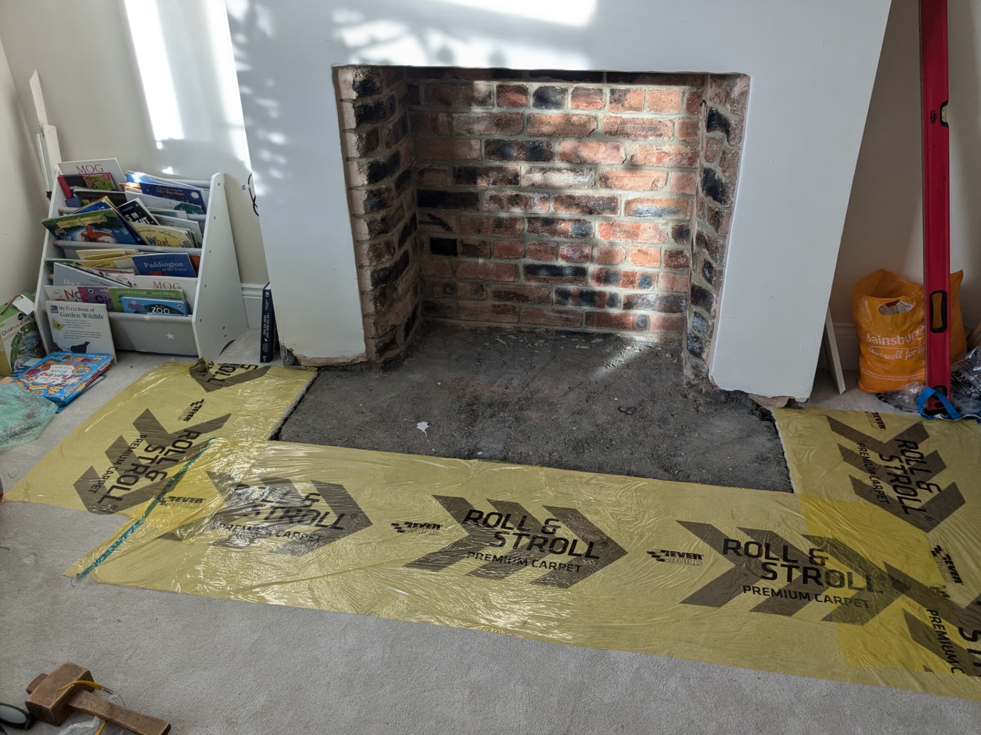 Fireplace hearth — original opening before work began