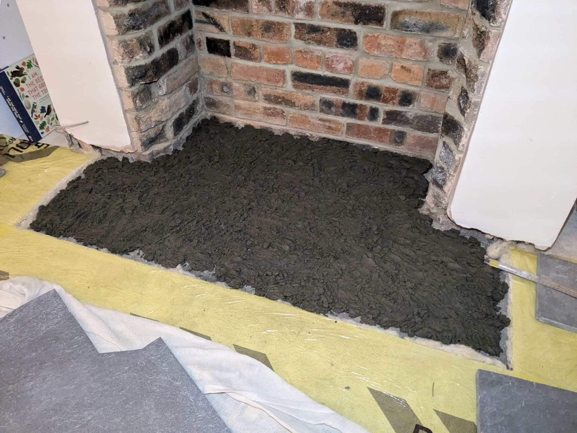 Fireplace hearth — fresh mortar bed prepared